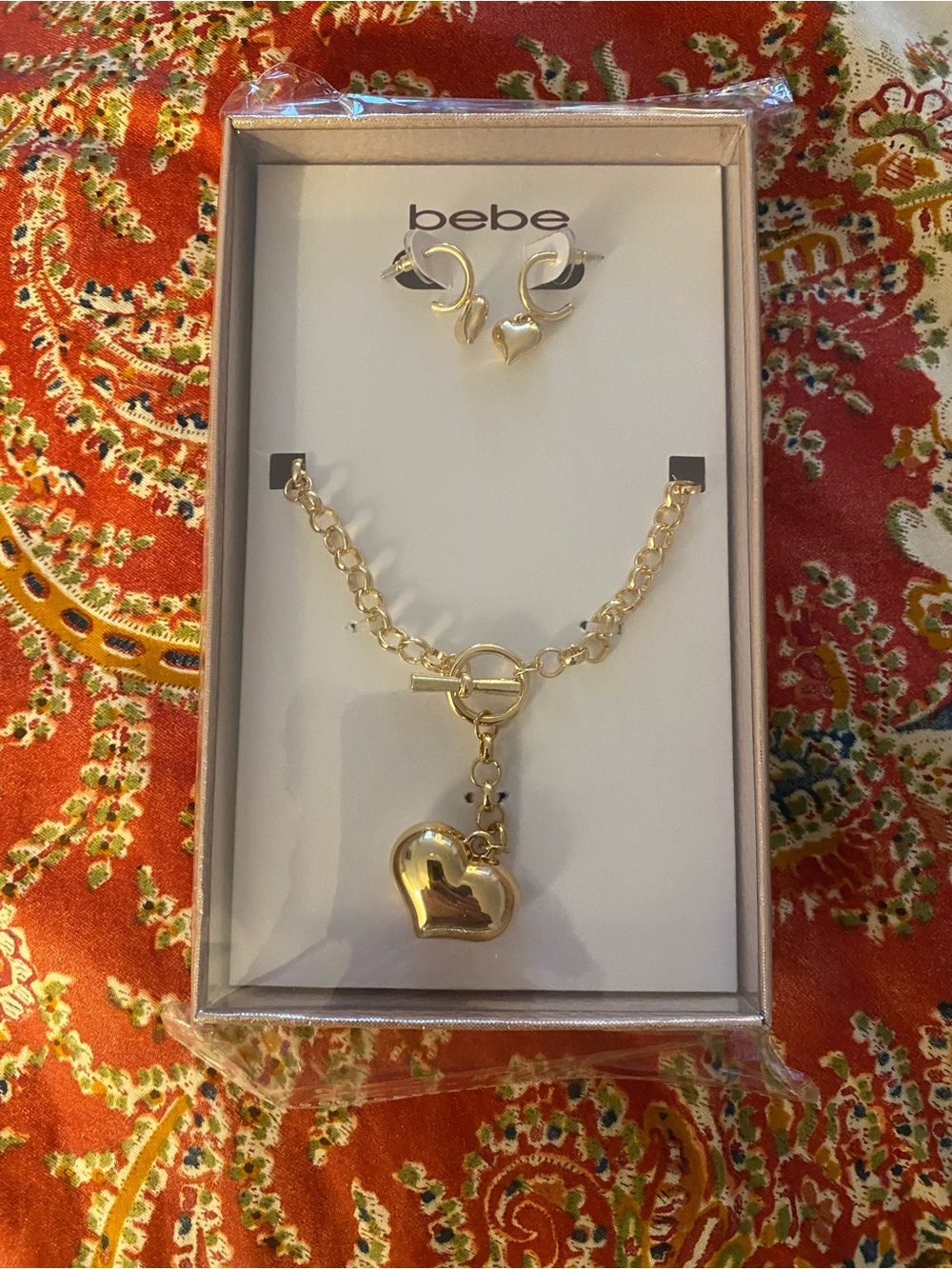 bebe Gold Heart Charm Bracelet and Earrings Set - Shiny Gold Tone